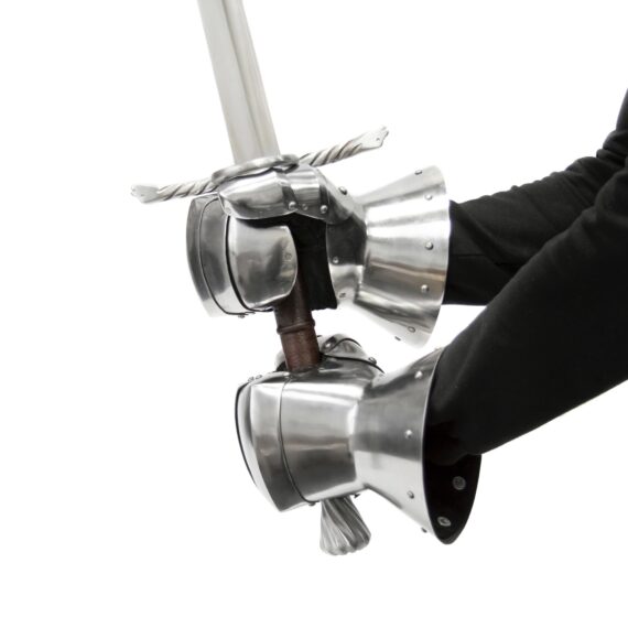 Two-handed saber in hands Plate mittens for medieval combat