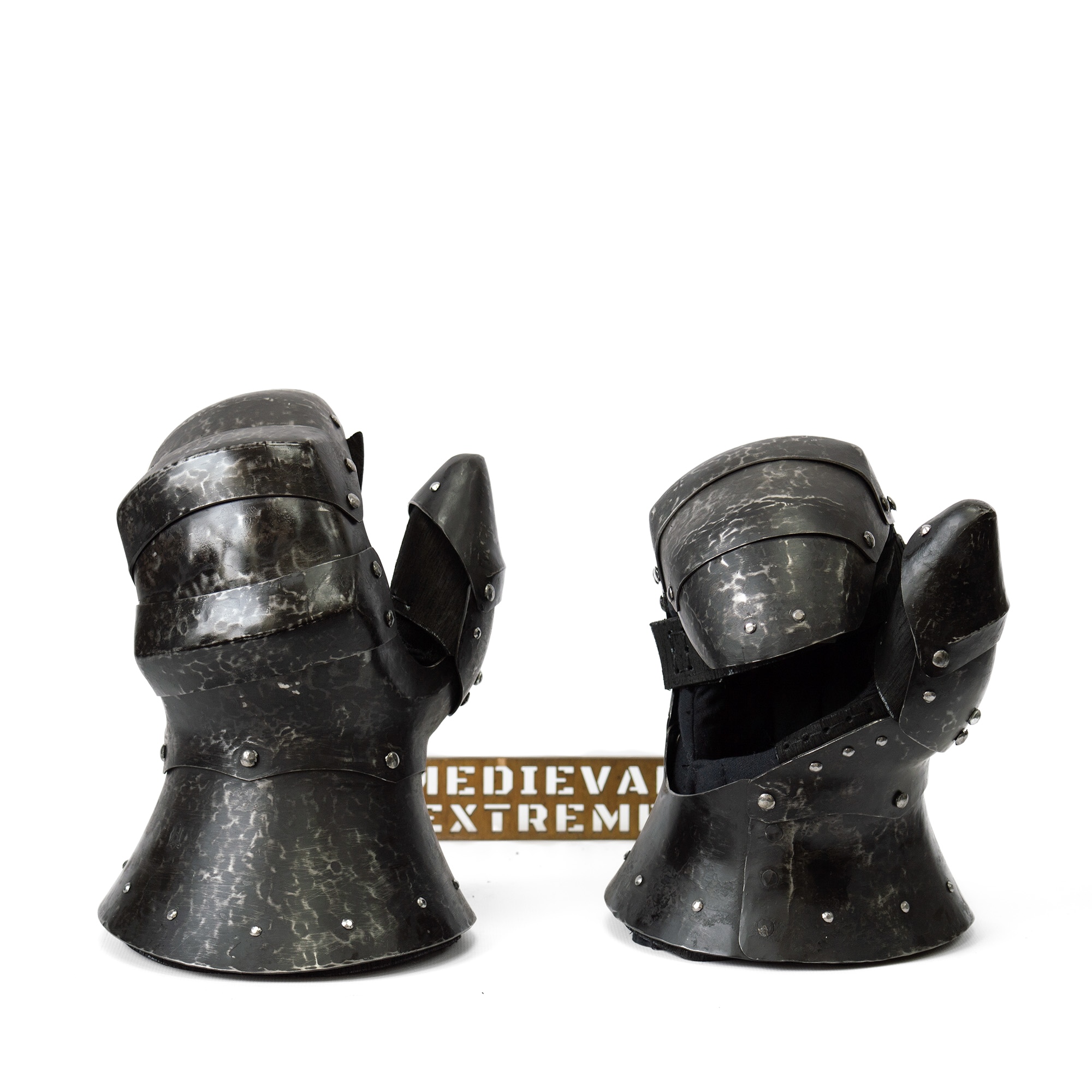 Blackened gauntlets for armored combat pair
