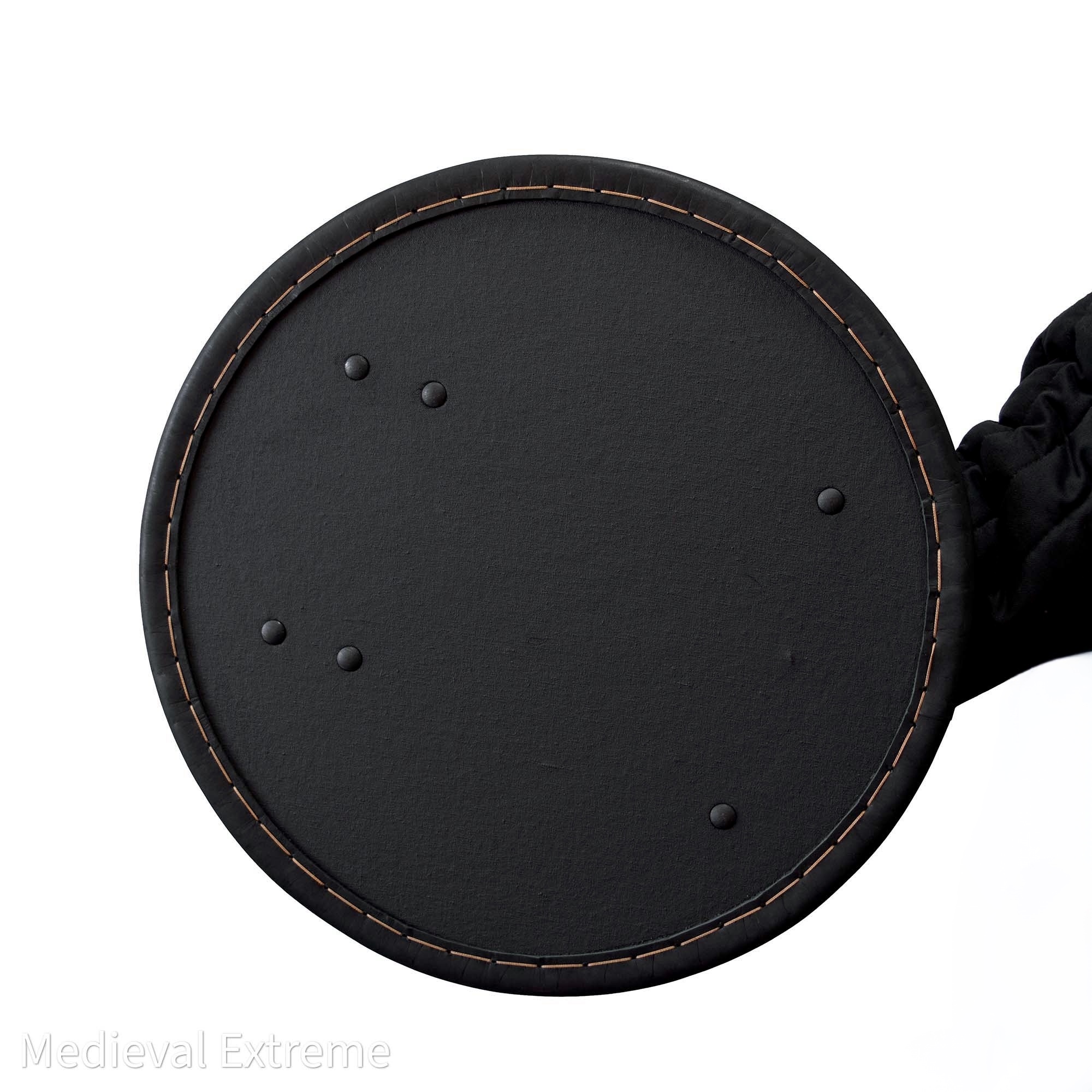 Round shield for armored combat in hand outside