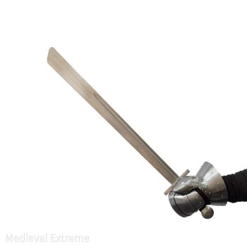 Medieval falchion for mass battles in hands with gauntlet