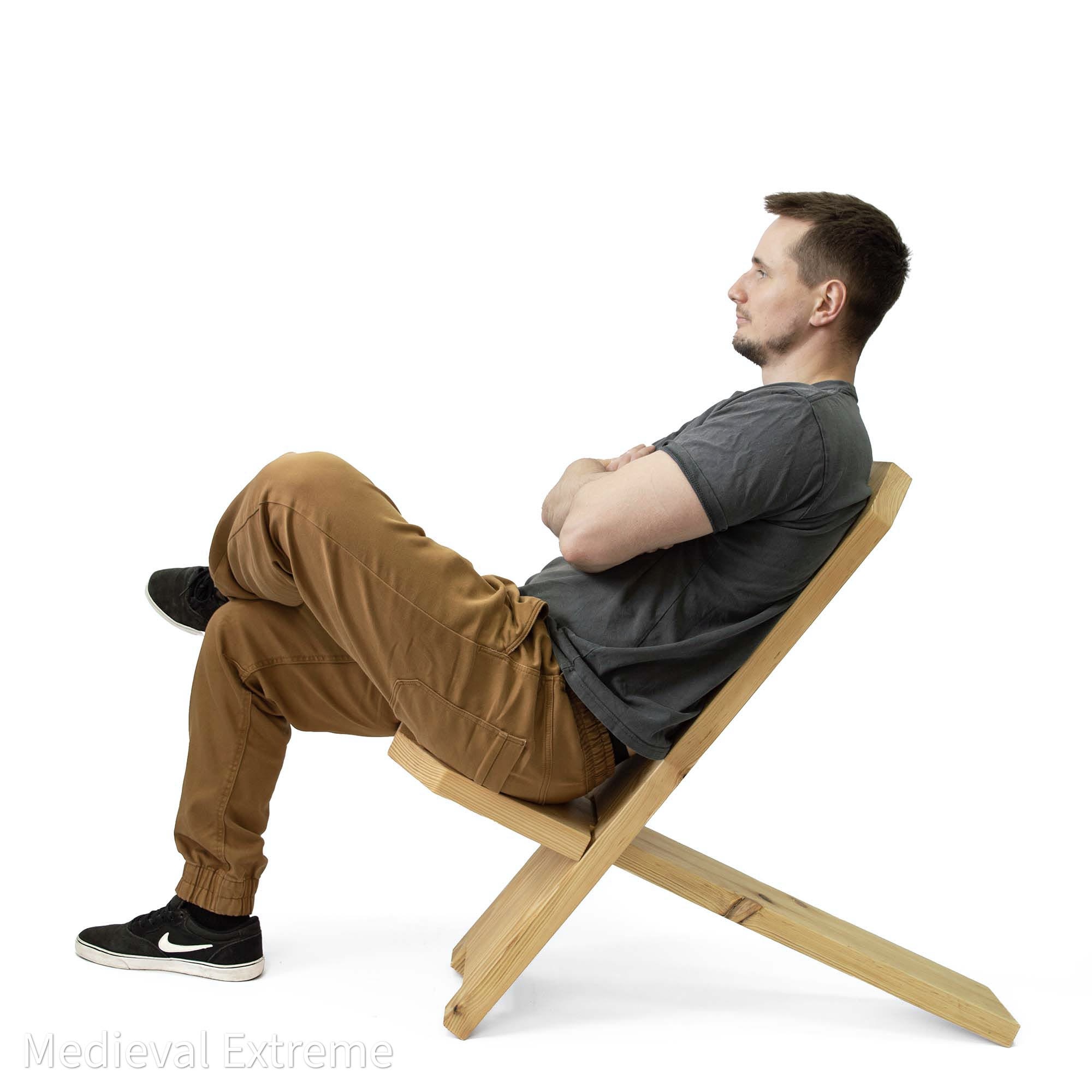 two-piece medieval camp chair close-up side with model on