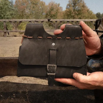 Leather Battle Belt Pouch for Armored Combat in hands