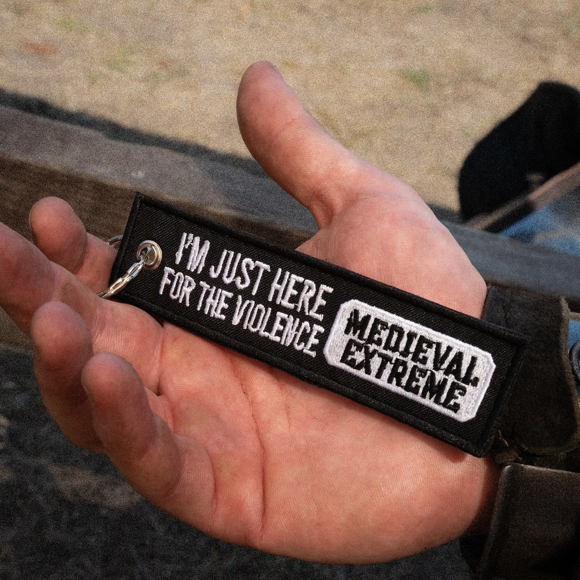 MedievalExtreme I’m Just Here for the Violence double-sided embroidered keychain in hand
