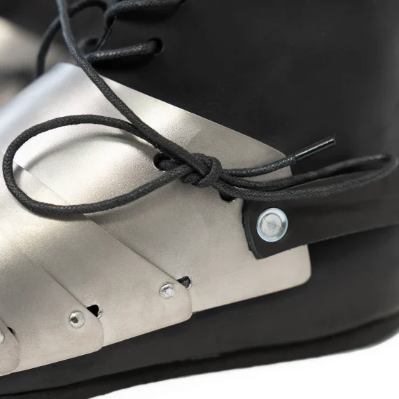 Phantom Sabatons attachment system with adjustable holes and leather straps side